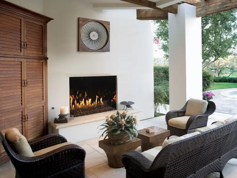 Swimming pool with seating area in outdoors room